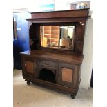 An Edwardian mahogany mirror back sideboard with drawer and two cupboard doors over two further