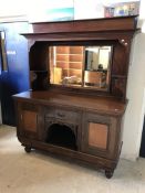 An Edwardian mahogany mirror back sideboard with drawer and two cupboard doors over two further