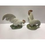 A pair of Royal Copehagen figures of cockerels "Cockerel head up" and "Cockerel head down", 10.5