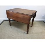 A Victorian mahogany drop-leaf Pembroke table, the top with moulded edge over single end drawer