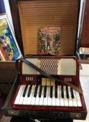 A Bell Galotta 26 key 48 base piano accordian German made by Weltmeister 35 cm wide housed in a