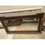 A mahogany and gilt framed rectangular wall mirror in the Georgian style with egg and dart