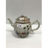 An 18th Century Chinese porcelain bullet shaped teapot, polychrome decorated with figures in a