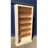 A modern painted pine open bookcase with adjustable shelving on a plinth base 97 cm wide x 30 cm
