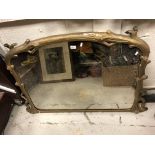 A Victorian gilt framed overmantel mirror of coppiced branch form enclosing a dome top plate, 125 cm