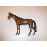 An Austrian patinated bronze figure of a stallion, stamped to underside "Made in Austria", 17.5 cm