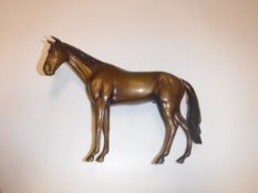 An Austrian patinated bronze figure of a stallion, stamped to underside "Made in Austria", 17.5 cm