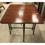 An Edwardian satinwood and barber pole strung drop-leaf Sutherland table on square collared supports
