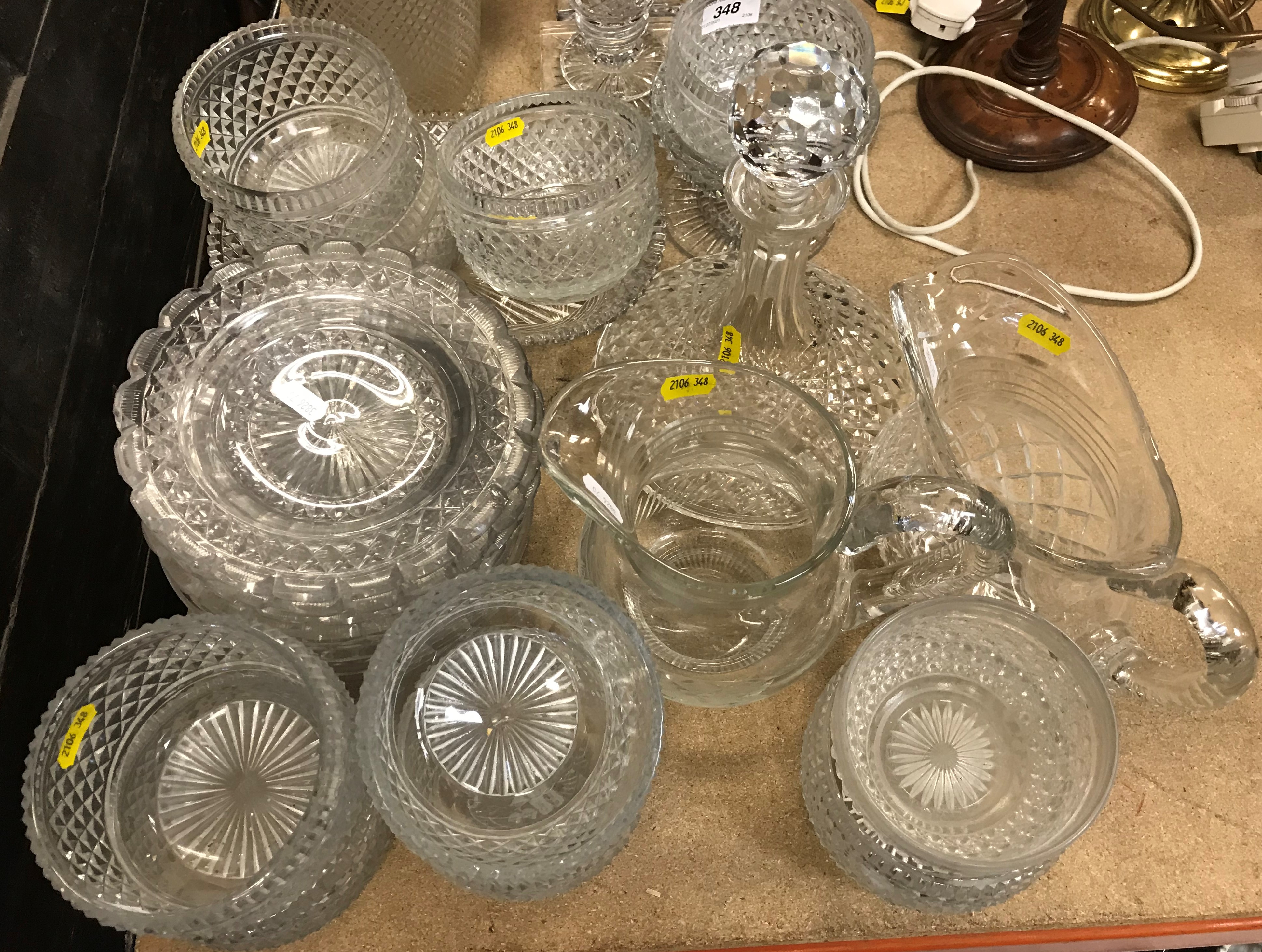 A collection of various cut and other glassware to include a pair of lustre type table lamps, two