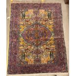 A mid 20th Century Tabriz rug, the central panel set with all-over animal and floral motifs on a