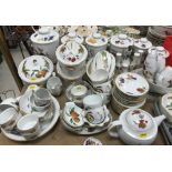 A large collection of Royal Worcester "Evesham" pattern dinner and kitchen wares including seven