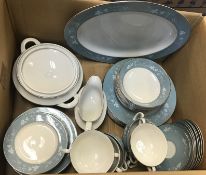 A box containing a Royal Doulton "Reflection" dinner service, all bar the dinner plates for eight