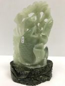 A 20th Century carved jade figure group of fish, approx 31.5 cm high