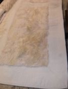 A Fendi white "Alligator and Fur" rug, decorated with fifteen rectangles of fur on a faux