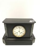 A late 19th Century black slate and marble cased mantel clock, the eight day French movement with