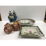 A collection of Chinese and Japanese porcelain to include a famille rose circular dish decorated
