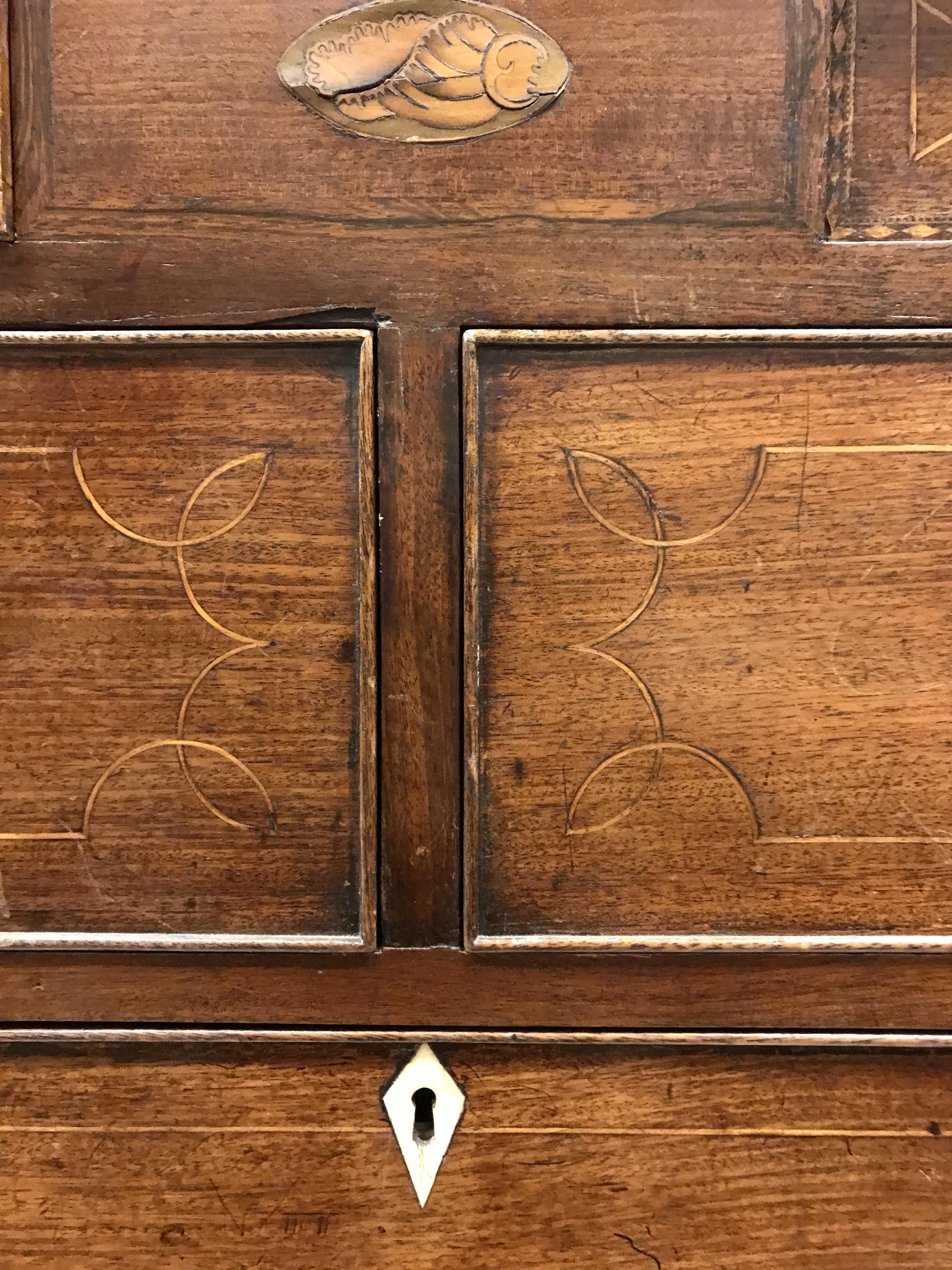 A 19th Century mahogany chest, the plain top above two secret drawers flanking a shell marquetry - Image 14 of 22