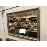 A modern gilt framed rectangular wall mirror, 100 cm x 69.5 cm