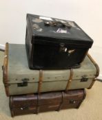 Two strapwork decorated cabin trunks, five various suitcases, two hat boxes and two leather and
