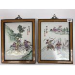 A pair of 20th Century Chinese polychrome decorated porcelain plaques depicting two figures on