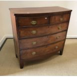 A 19th Century mahogany bow fronted chest, the plain top over two short and three long graduated