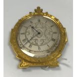 A 19th Century Gothic Revival style engraved brass cased bedside clock in the manner of Thomas Cole,