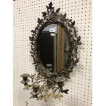 A 19th Century gilt brass oak leaf and acorn framed girandole mirror with three branch like