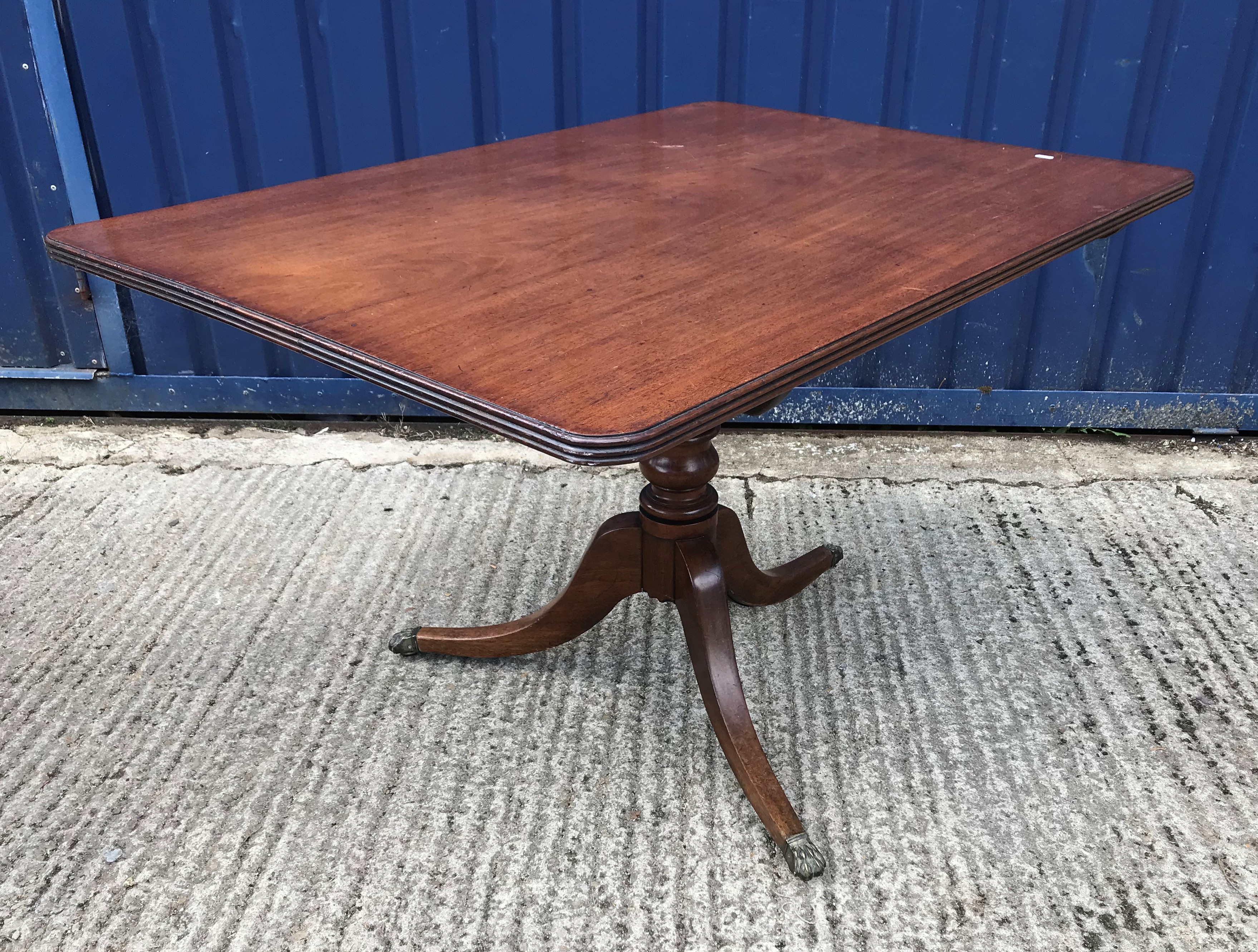 An early 19th Century mahogany tea table, the rounded rectangular snap top with reeded edge on - Image 2 of 2