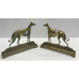 Two cast brass fire ornaments "Farndon Ferry" and "Col Norths Fullerton" (Greyhounds), a pair of day