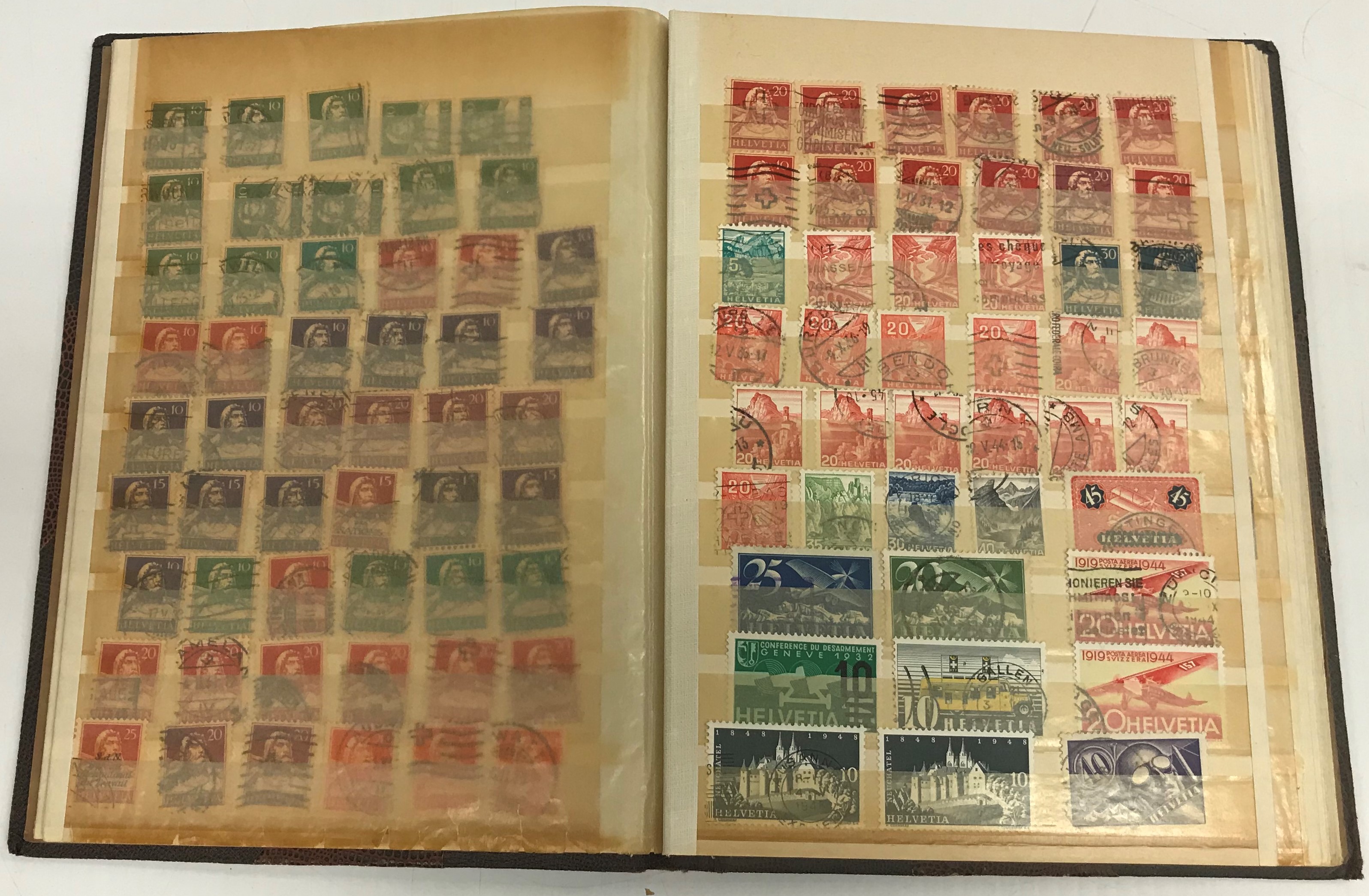26 various albums of British and World stamps, together with three shoe boxes of various un-