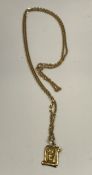 An 18 carat gold chainlink necklace set with an 18 carat gold pendant with embossed head of Christ