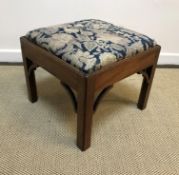 A 19th Century mahogany framed stool with floral needlework drop-in seat within a moulded edge, on