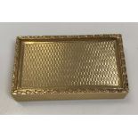 A 9 carat gold engine turned snuff box with sliding top and harebell banded edge by S.J. Rose &