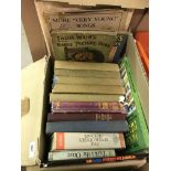 Four boxes of childrens' books and books on the subject of games, etc to include A A MILNE "More