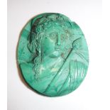 A 19th Century carved malachite bust medallion depicting "Flora", 3.5 cm x 2.9 cm