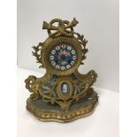 A 19th Century French gilt bronze and bleu celeste porcelain panelled mantel clock in the Sèvres