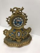 A 19th Century French gilt bronze and bleu celeste porcelain panelled mantel clock in the Sèvres