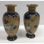 A pair of Doulton Lambeth relief work floral decorated vases with flared rims, 29.6 cm highCondition