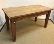 A modern pine farmhouse style kitchen table with single end drawer on square supports by Mulberry