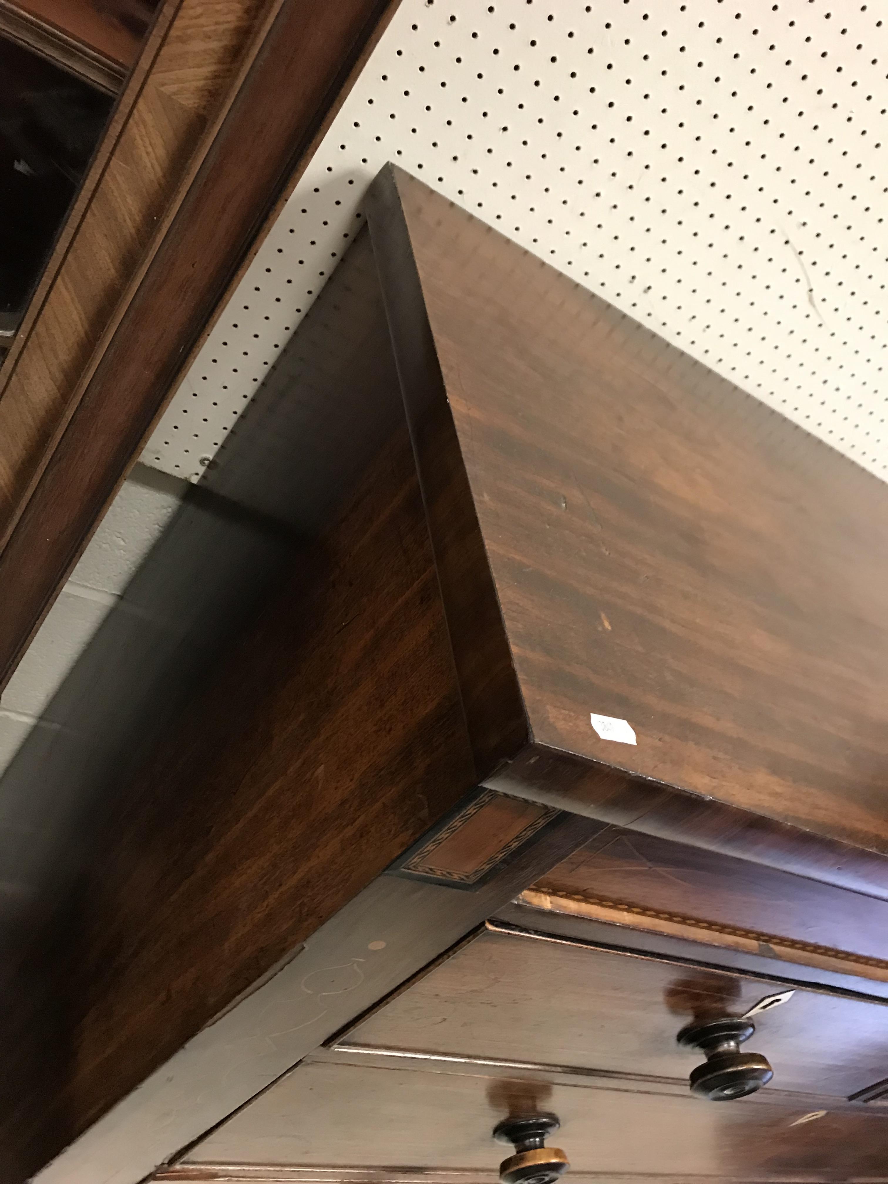 A 19th Century mahogany chest, the plain top above two secret drawers flanking a shell marquetry - Image 4 of 22