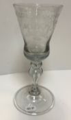 A 19th Century Dutch engraved ‘friendship’ goblet with armorial decoration of two hands clasped,