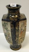 A Meiji Period Japanese Satsuma vase of hexagonal form, decorated with panels of figures by a