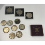 A collection of Victorian and later crowns and shillings to include an 1889, 1890 and 1893 crowns,