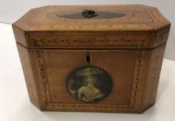 A George III satinwood and marquetry inlaid tea ca