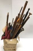 A collection of forty-five various canes and parasols (many with damage, for spares)