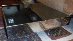 A 20th Century polished steel framed mirror top co
