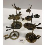 A collection of six 18th Century brass wax jacks various