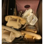 Four various vintage cream plastic telephones, together with a vintage Pifco Princess Whisper