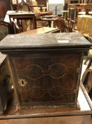 An 18th Century walnut and box wood strung table or wall mounted cabinet with single door