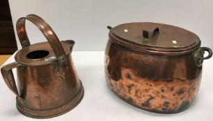 A Victorian copper water jug, Victorian oval copper cauldron with lid and iron lugs and two jam